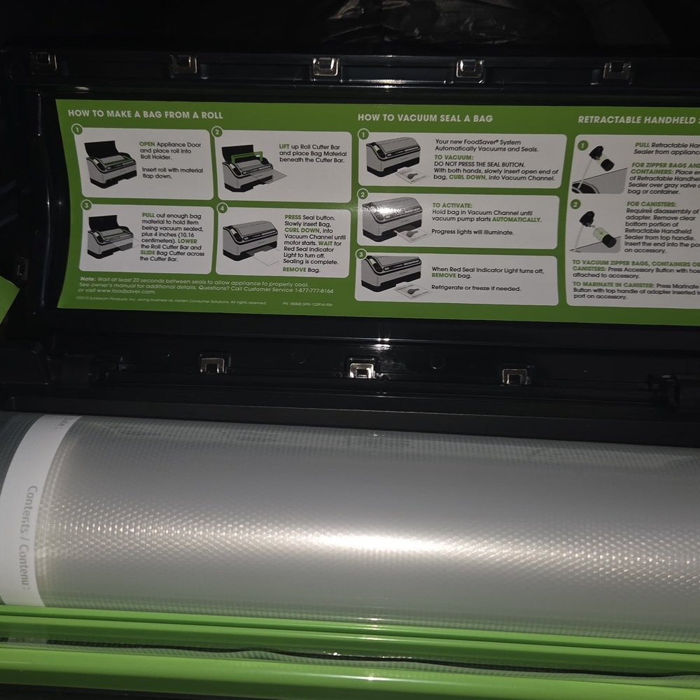 Compact Vacuum Sealer with Green Highlights
